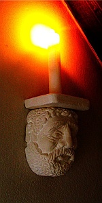 Hand carved wall candle-holdera